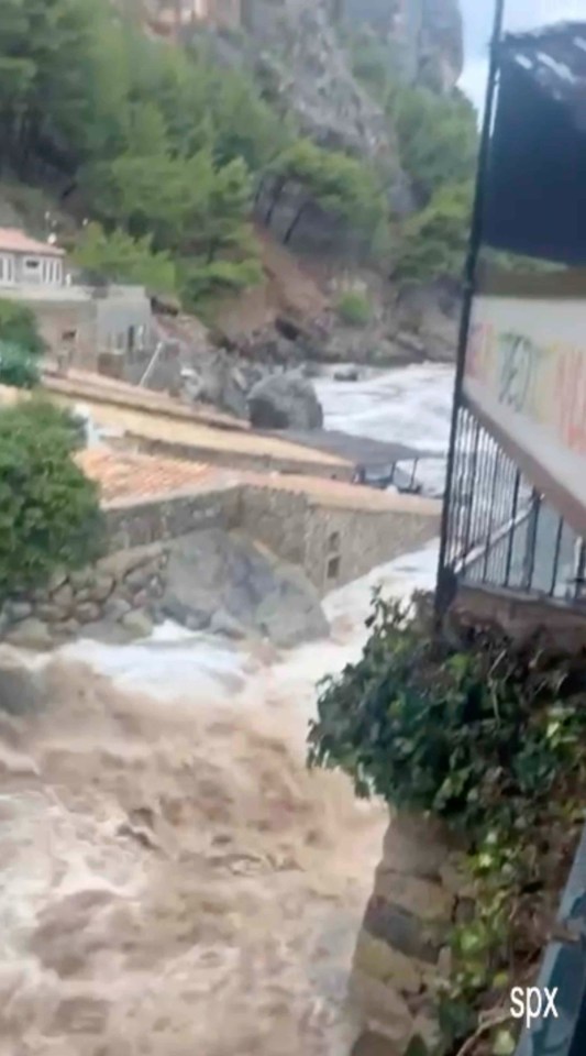 Footage shows water rushing through a resort at the mouth of Pareis River