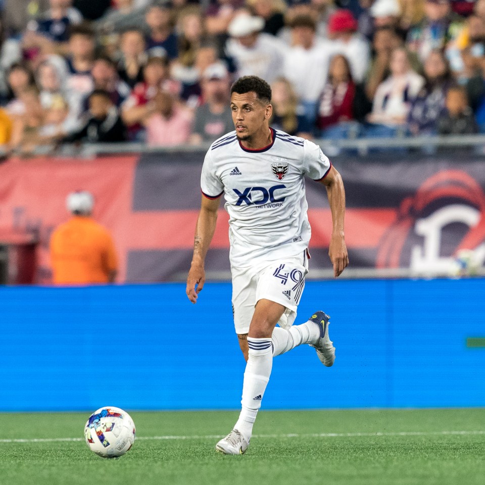 a soccer player with the number 49 on his jersey