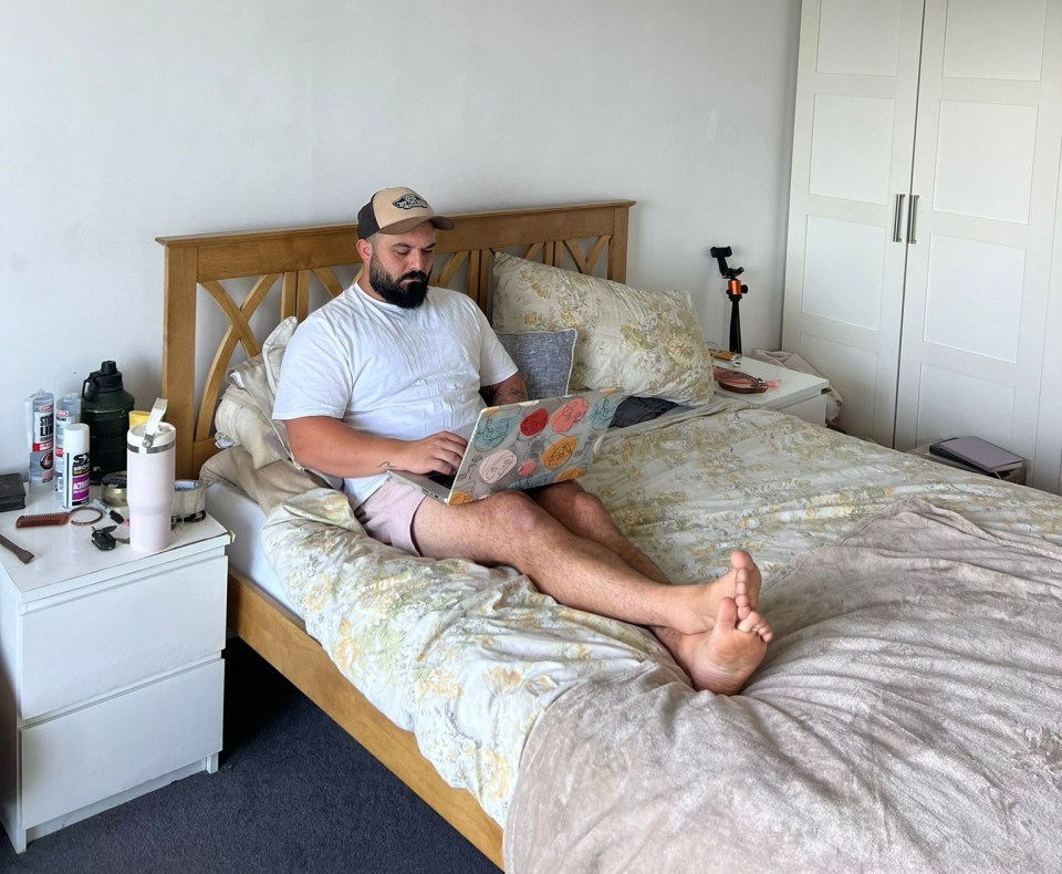 Kai pictured in his old Brighton flat where he paid £1,100 a month in rent and bills