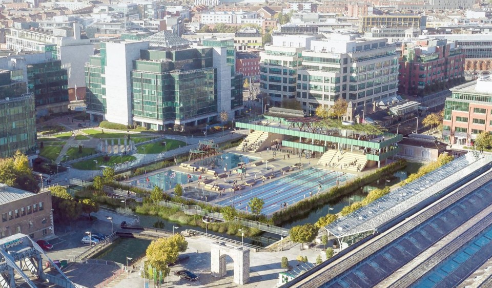 an aerial view of a city with lots of buildings