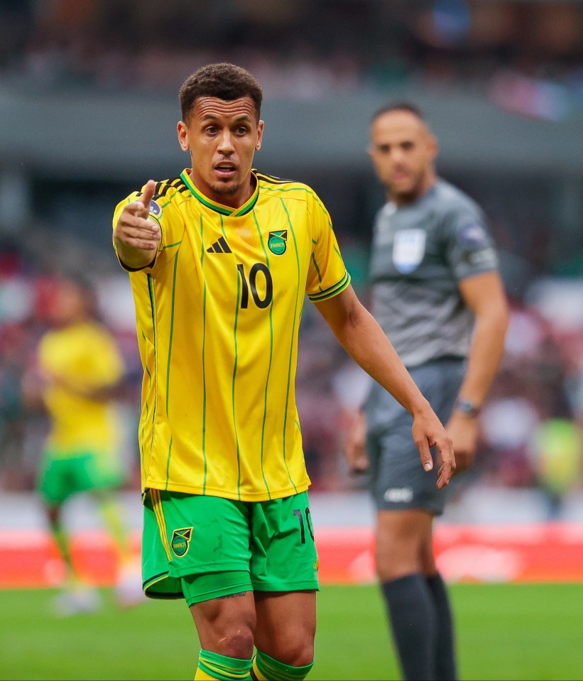 a soccer player wearing a yellow and green jersey with the number 10 on it