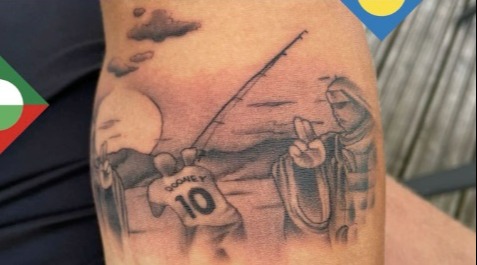 a tattoo of a man with the number 10 on his back