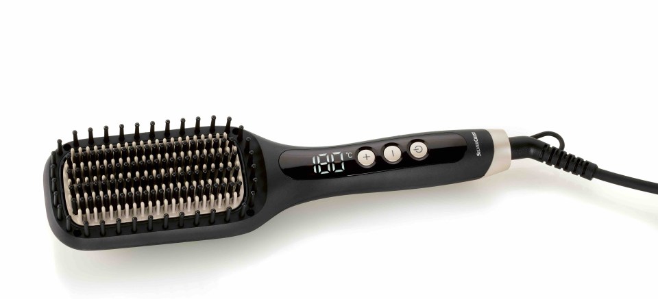 a hair straightener with a digital display that reads 180 degrees