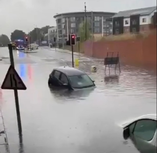 Heavy rainfall has caused flooding in Dunstable with cars left under water