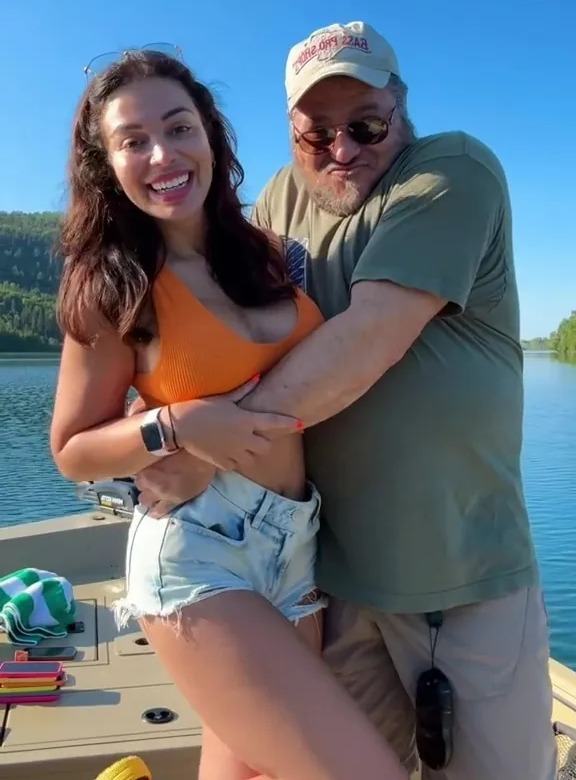 a man and a woman on a boat with a caption that says " bet we would have dated in college "