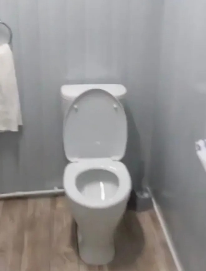 The officer even has a toilet separate to his shower