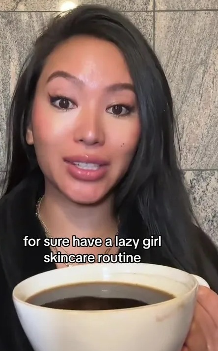 a woman holding a cup of coffee with the caption anti-aging tips no one talks about for sure have a lazy girl skincare routine