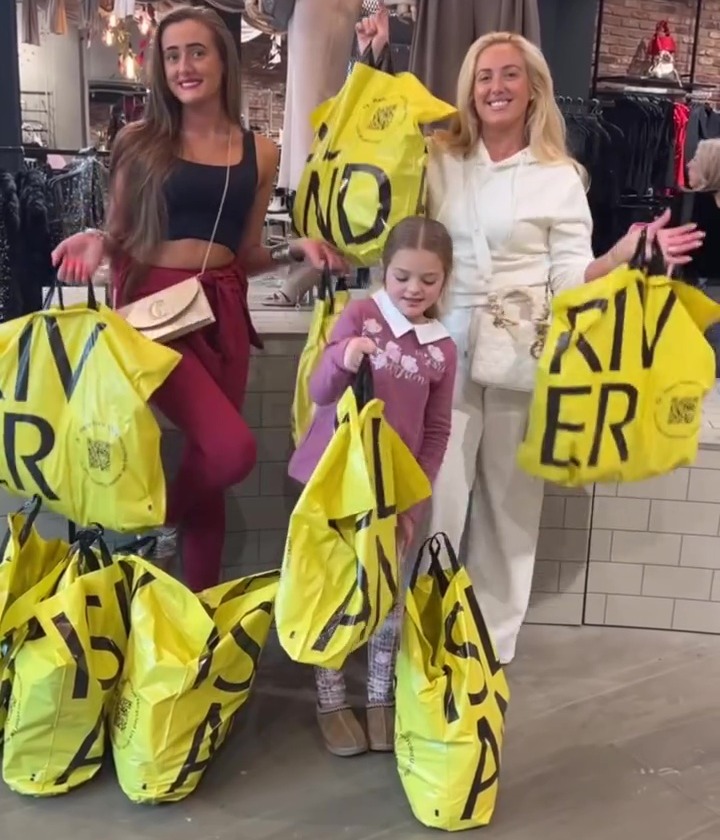 They were laden with bags at the end of their shopping trip