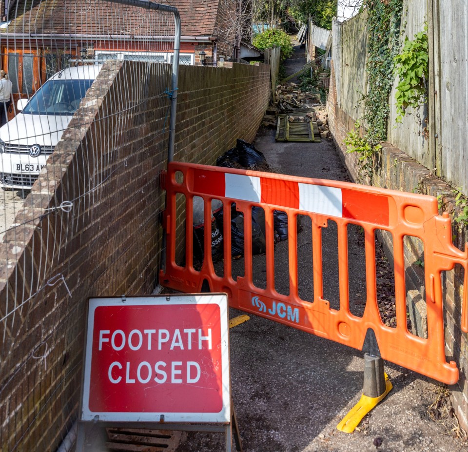 The alleyway at the centre of a neighbour row in Hove