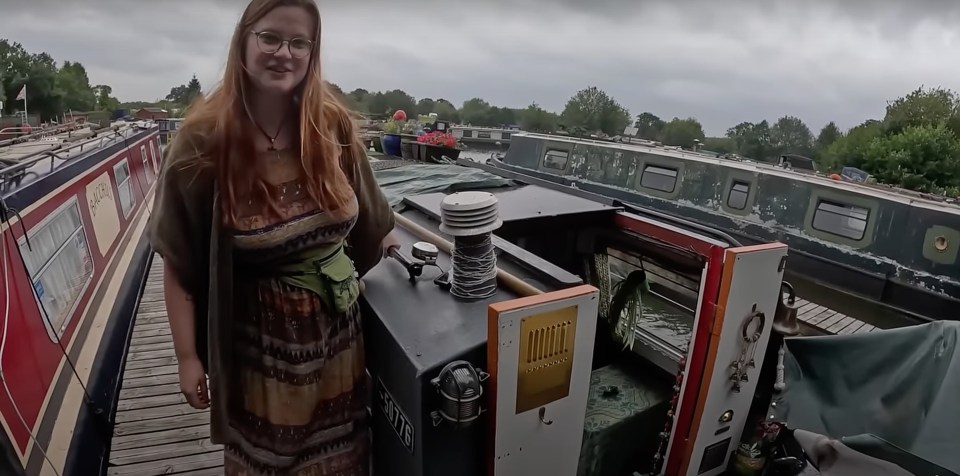 a video of a woman on a boat titled 20ft micro narrowboat tour