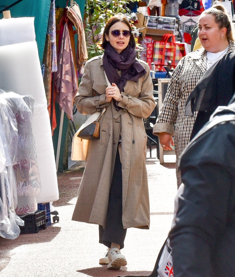 Emily In Paris star Lily Collins heads out for an afternoon stroll in London