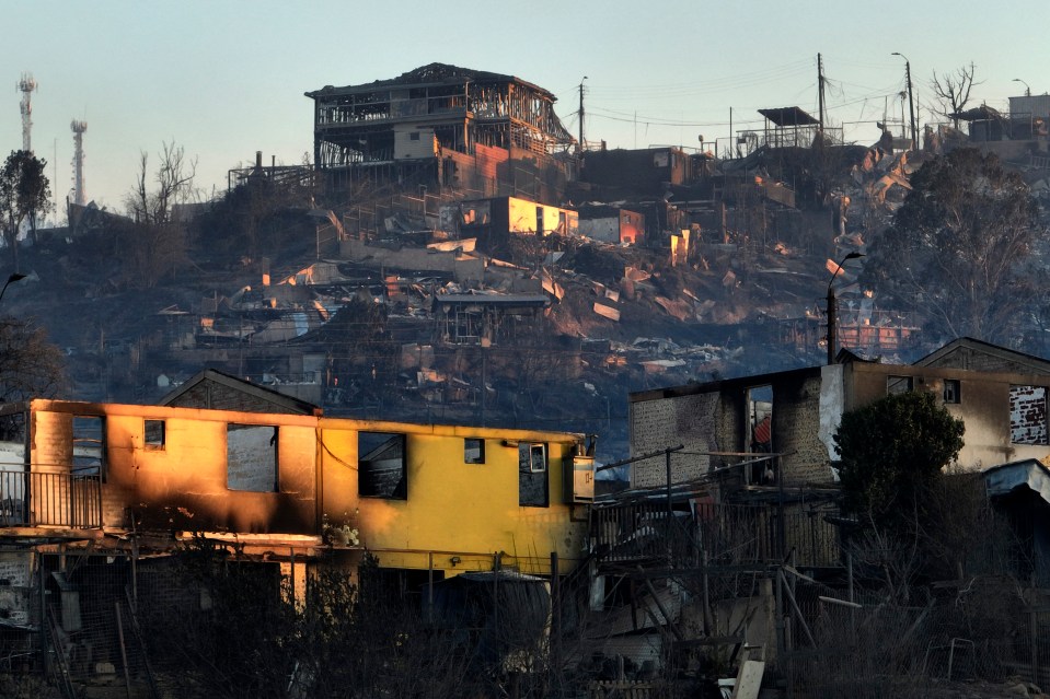 Homes seen destroyed after the fire ripped through the village