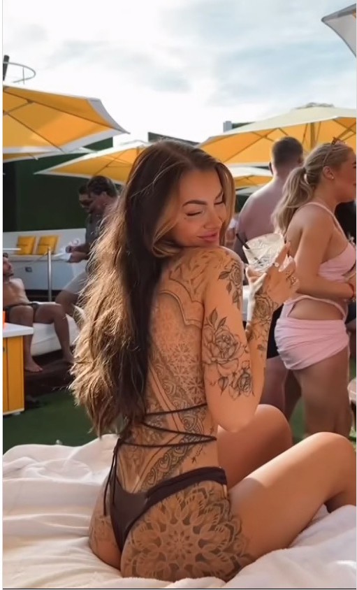 (TAKEN WITHOUT PERMISSION), Love Islands Abigail Rawlings shows off her back tattoos in tiny thong bikini in video from Ibiza, //www.instagram.com/p/DABZNy9oqPY/, Credit: Instagram