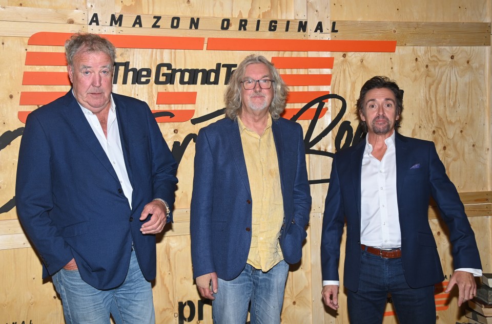 three men stand in front of a sign that says amazon original