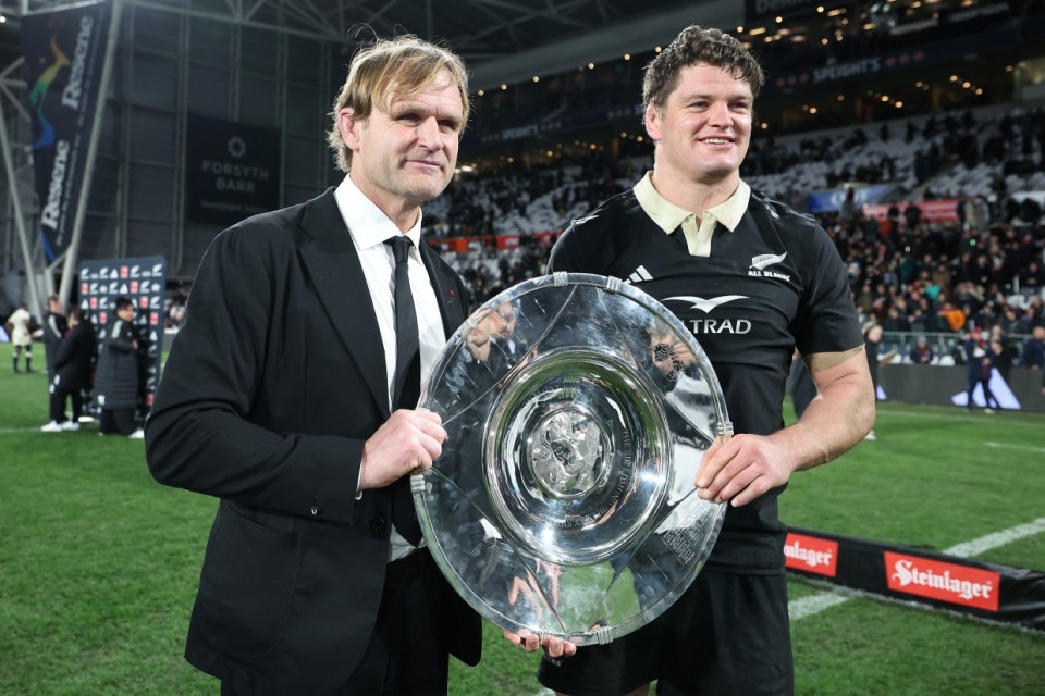 DUNEDIN, NEW ZEALAND - JULY 06: All Black Head Coach Scott Robertson (L) and captain Scott Barrett of the New Zealand All Blacks (R) following the International Test Match between New Zealand All Blacks and England at Forsyth Barr Stadium on July 06, 2024 in Dunedin, New Zealand. (Photo by Hannah Peters/Getty Images)