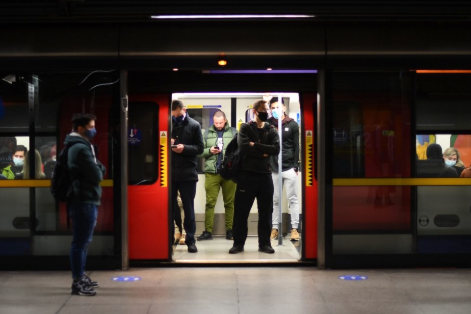 Commuters on a Jubilee Line Underground train at Canning Town station, London, at 0720 in the morning rush hour at the start of a four week national lockdown for England. PA Photo. Picture date: Thursday November 5, 2020. See PA story HEALTH Coronavirus. Photo credit should read: Victoria Jones/PA Wire