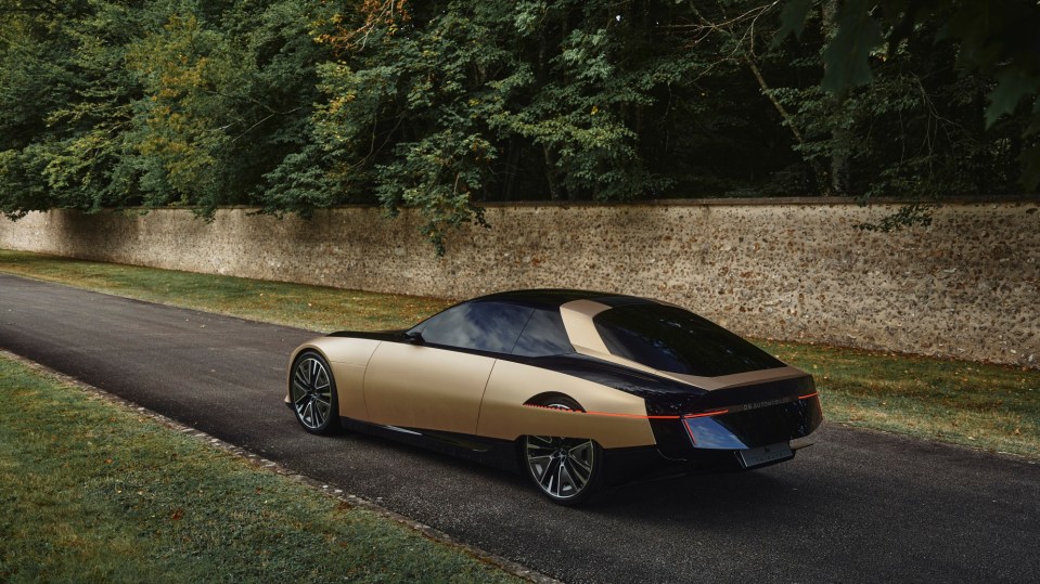 The SM Tribute concept stays true to the original's sleek, low-slung coupe silhouette