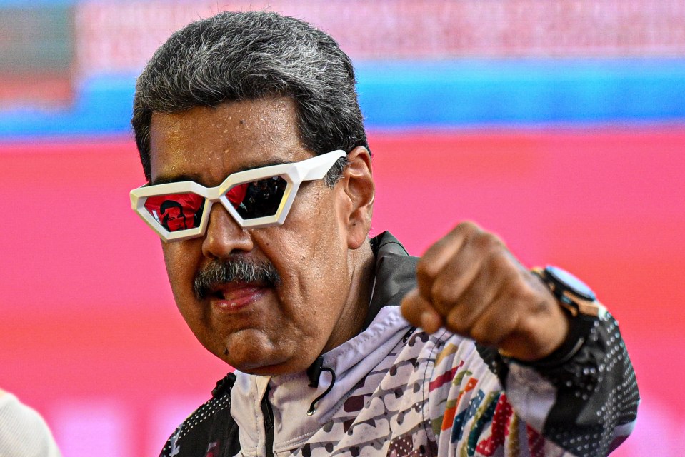 Maduro greets supporters during a campaign rally