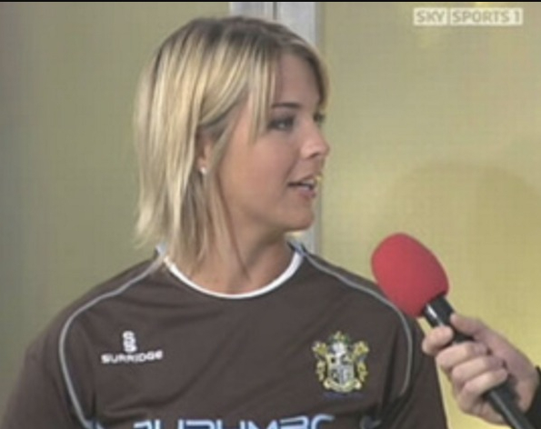 a woman is being interviewed on sky sports 1