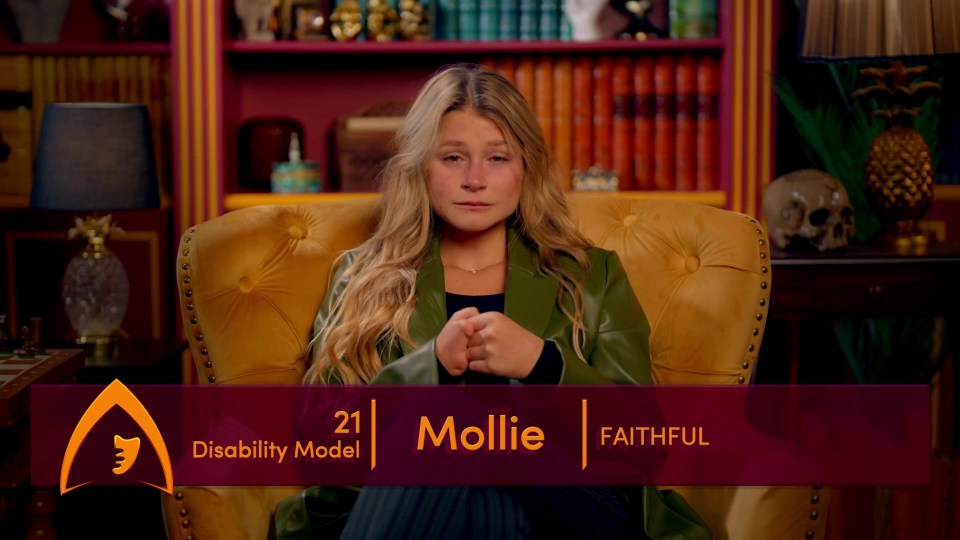 a woman is sitting in a chair with a sign that says ' mollie faithful '