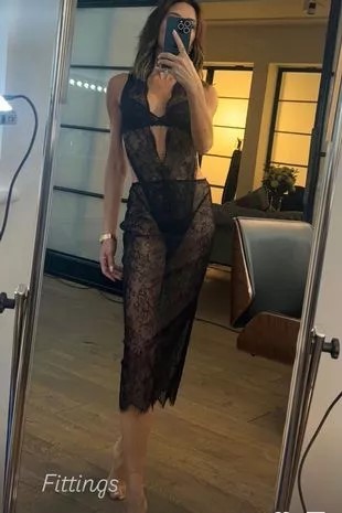 Posh wows in lace cut-out dress on social media.