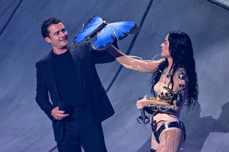 Onstage with her fiance, actor Orlando Bloom at the 2023 MTV music video awards