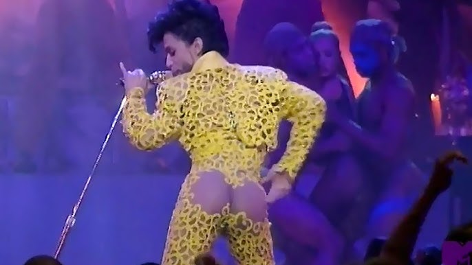 Prince showed off his behind in a suit that appeared to be cut out over his bottom