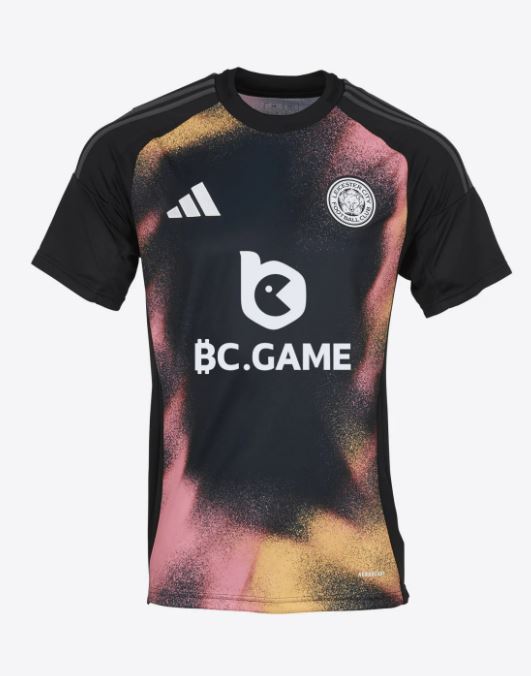 Leicester City's black Adidas shirt, with gold and pink splashes, looks faded