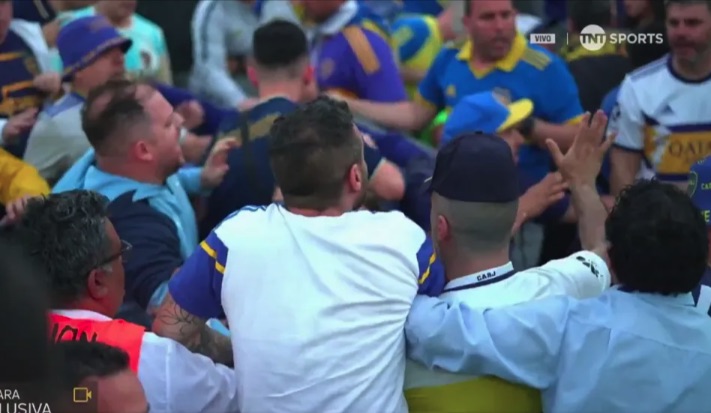 Romero had to be restrained by Boca officials and team-mates