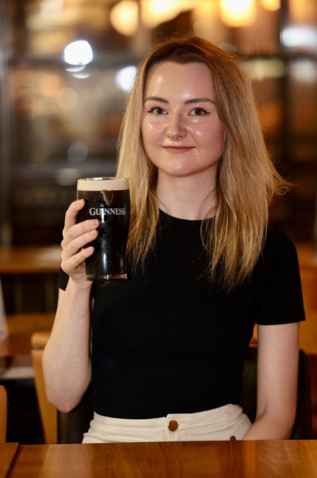 Sun Reporter Laura McGuire having a pint of Guinness at the Lion and Unicorn,.