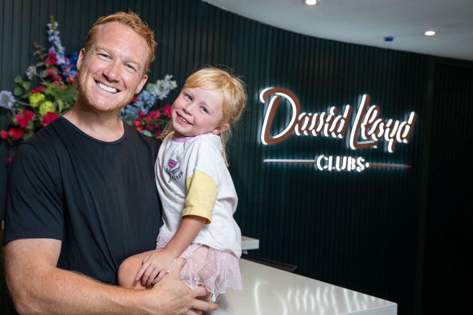 Olympic gold medal high jumper Greg Rutherford with his daughter