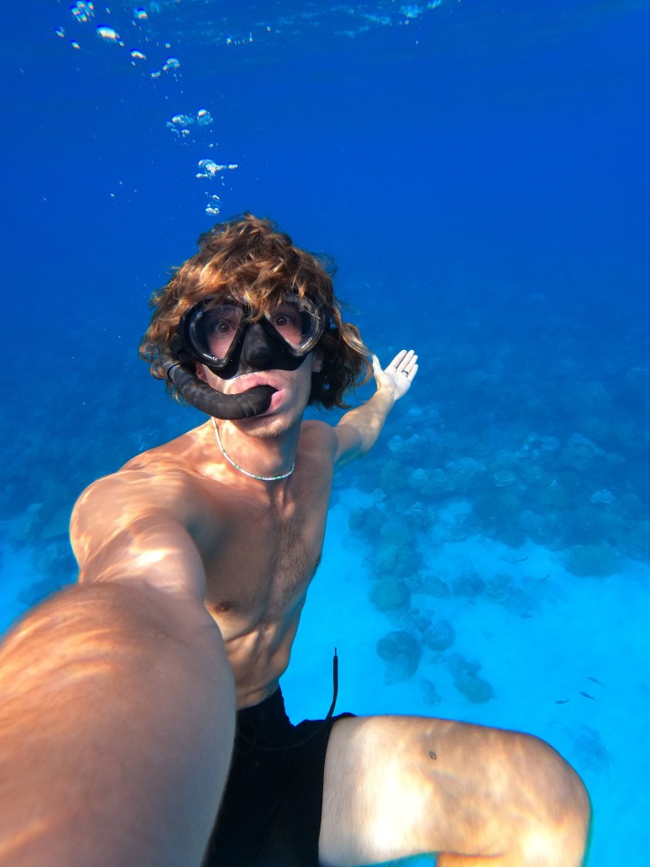 Angus swimming in French Polynesia before running into serious trouble