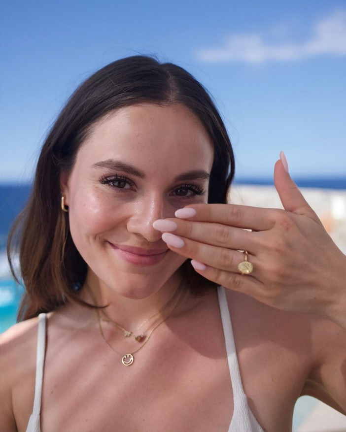 She showed off her huge engagement ring