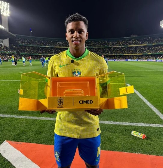 The Brazilian shows off the bizarre prize