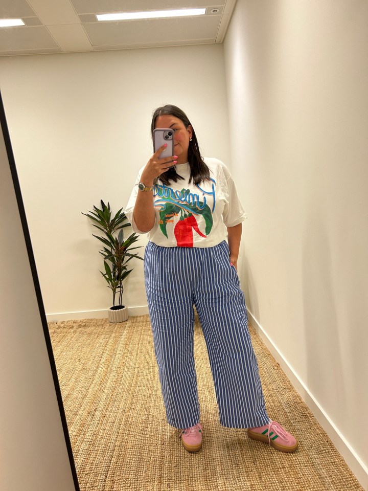 I stroll in the office wearing my trainers, crinkled tops and blue and white striped trousers, says Abby