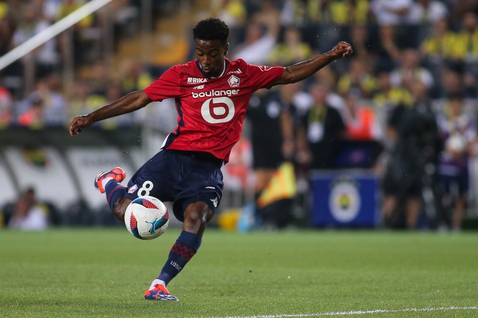 a soccer player wearing a jersey that says boulanger on it