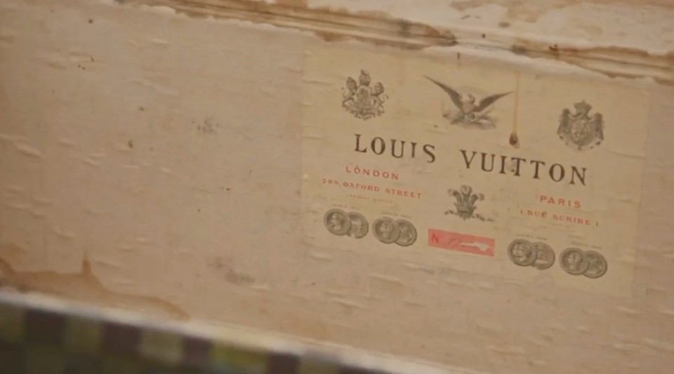 a piece of paper that says louis vuitton on it