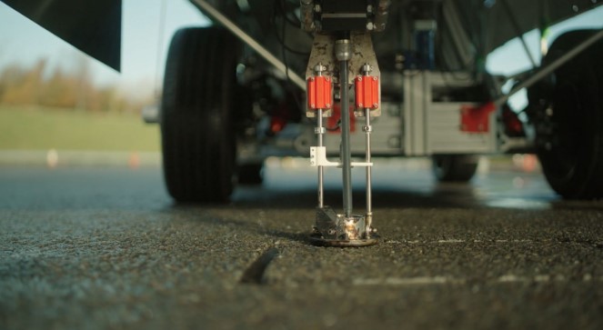 It uses advanced AI to detect and fill cracks in the road