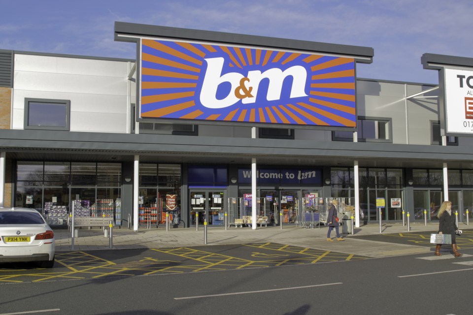 a b & m store with a welcome to b & m sign