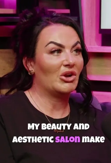 a woman sitting in front of a microphone talking about her beauty and aesthetic salon make