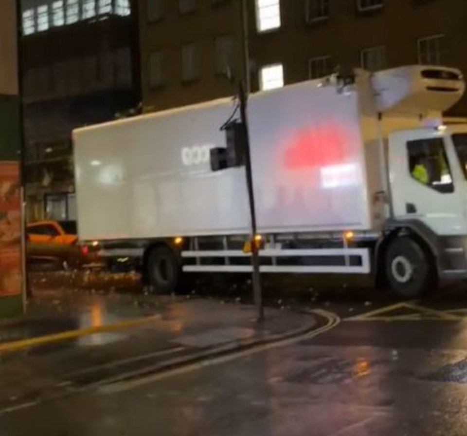 A lorry clipped a tree knocking it onto the sports car on Thursday night