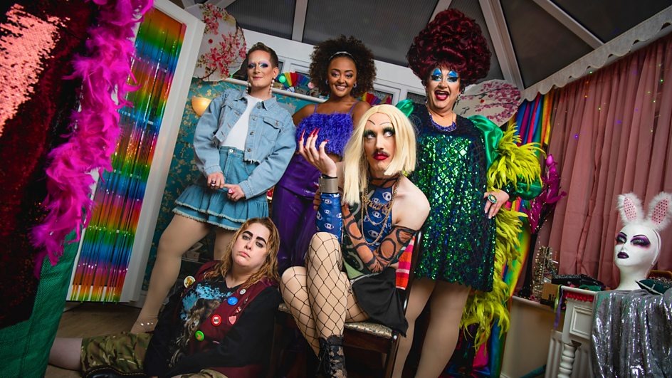 a group of drag queens are posing for a picture