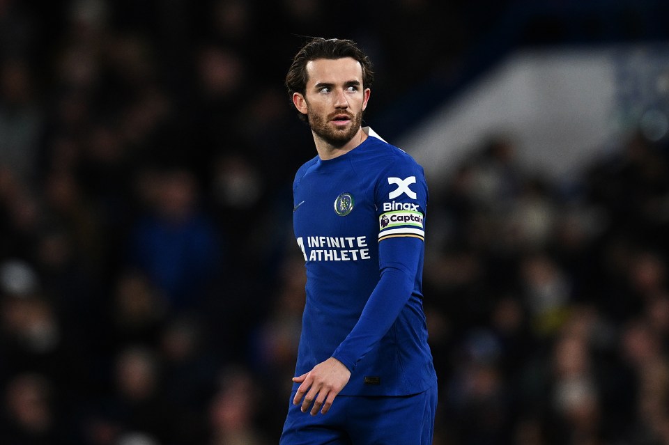 soccer player wearing a blue jersey that says infinite athlete