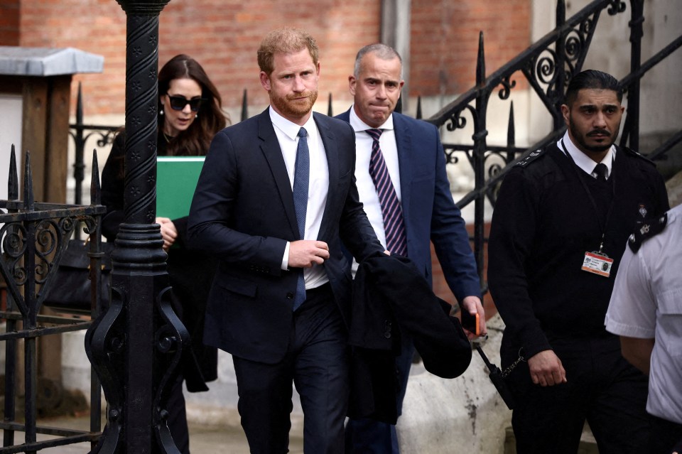 A gloomy Harry is spotted at the High Court for a personal protection hearing