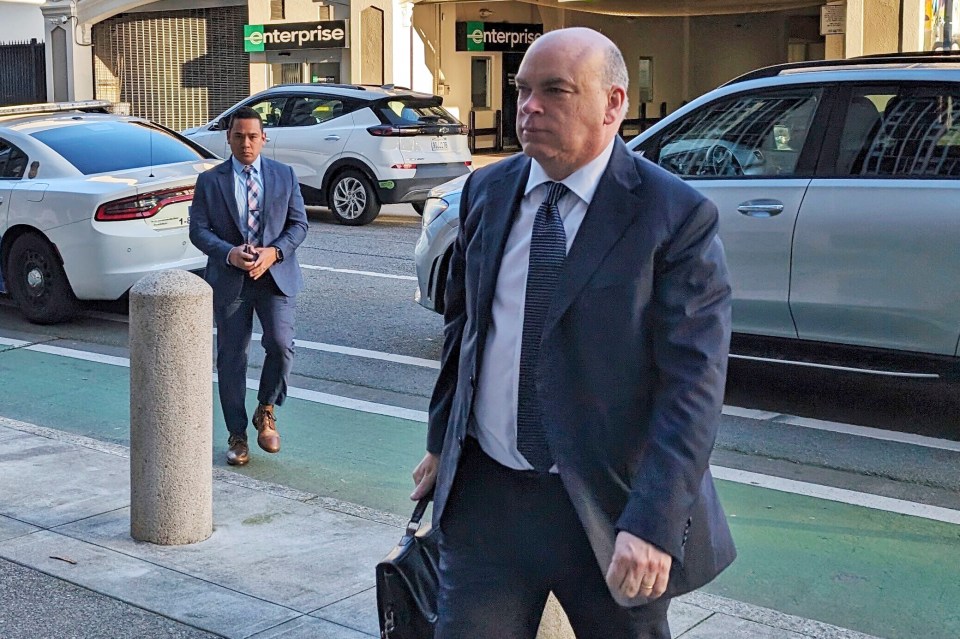 Mike Lynch walks into federal court in San Francisco, March 26, 2024