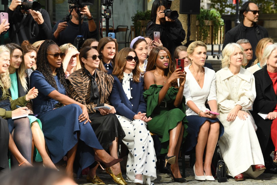 The Prime Minister's wife sat front row at Edeline Lee's Westminster show, dressed in a four-figure outfit by the British designer