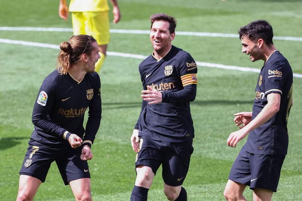 Antoine Griezmann, Lionel Messi and Pedri in Barca's most recent black shirt