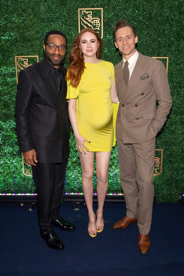 Karen posed beside co-stars Tom Hiddlestone and Chiwetel Ejiofor