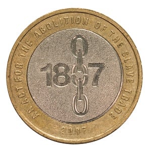 a gold and silver coin with the year 1847 on it