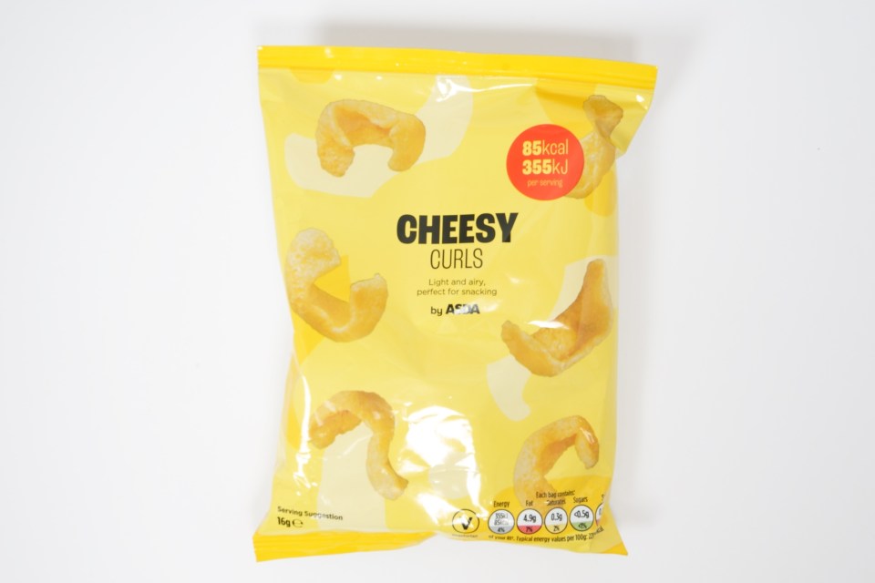 a yellow bag of cheesy curls chips